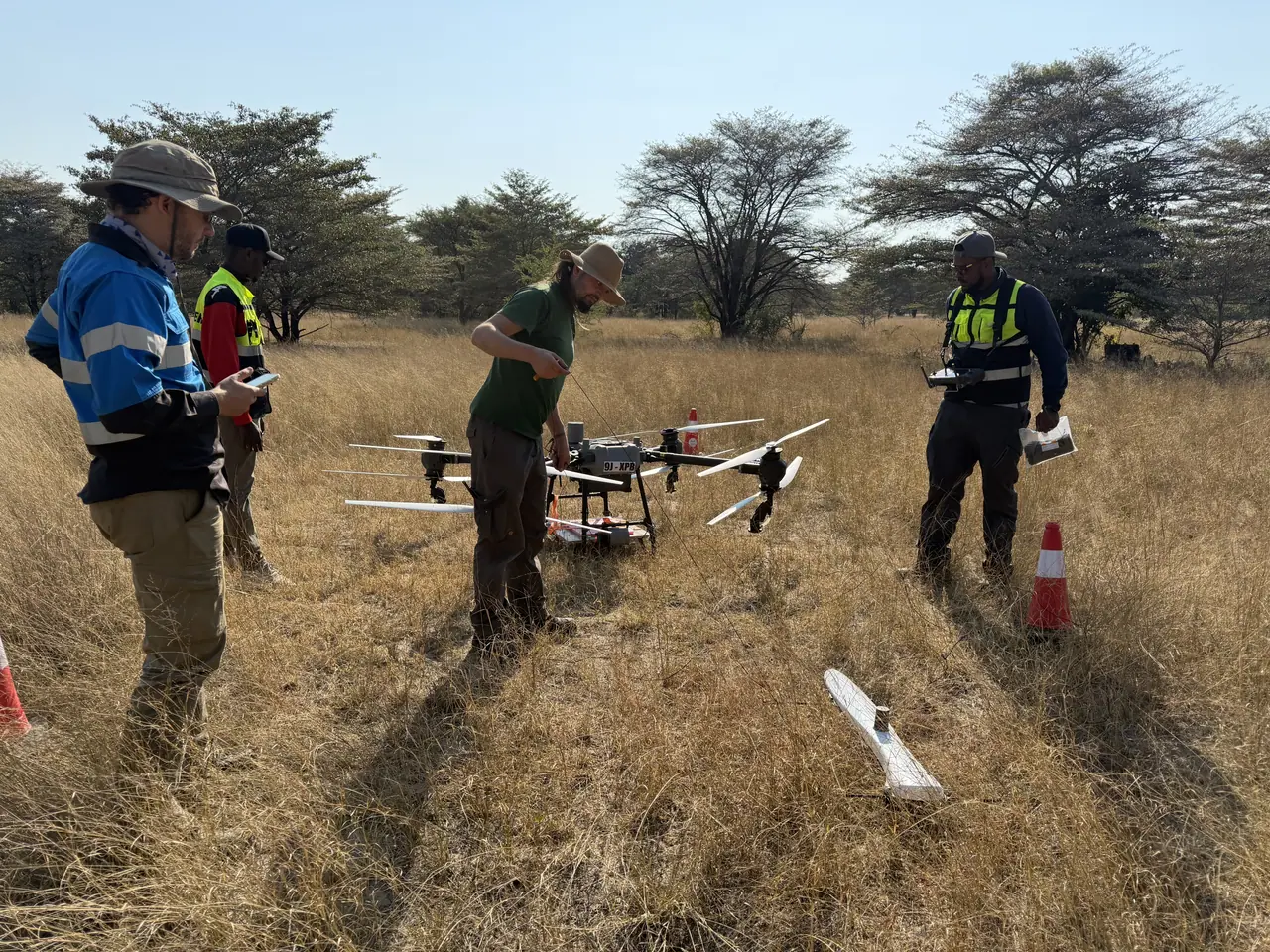 Dragonfly Aviation crew preparing a survey UAV for geophysical electromagnetic flights in the Machile-Zambezi Basin