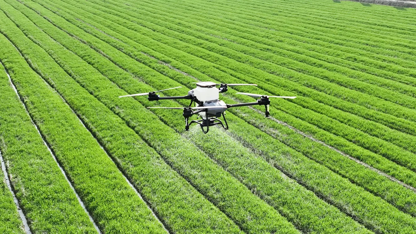 Dragonfly Aviation agricultural spray drone over farmland in Zambia